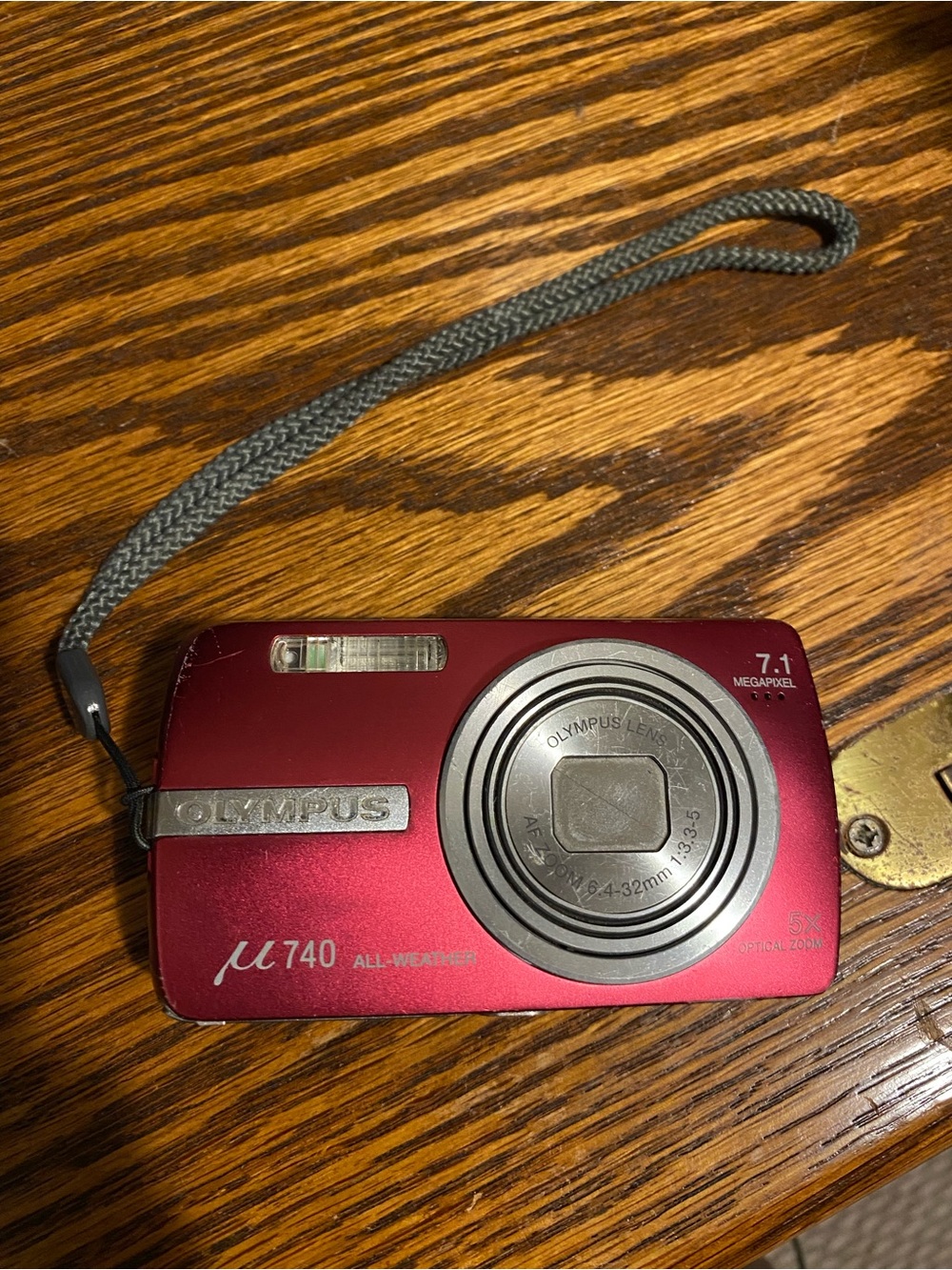 Olympus µ740 red digital camera (PARTS OR EXPERIMENTAL PHOTOS)
